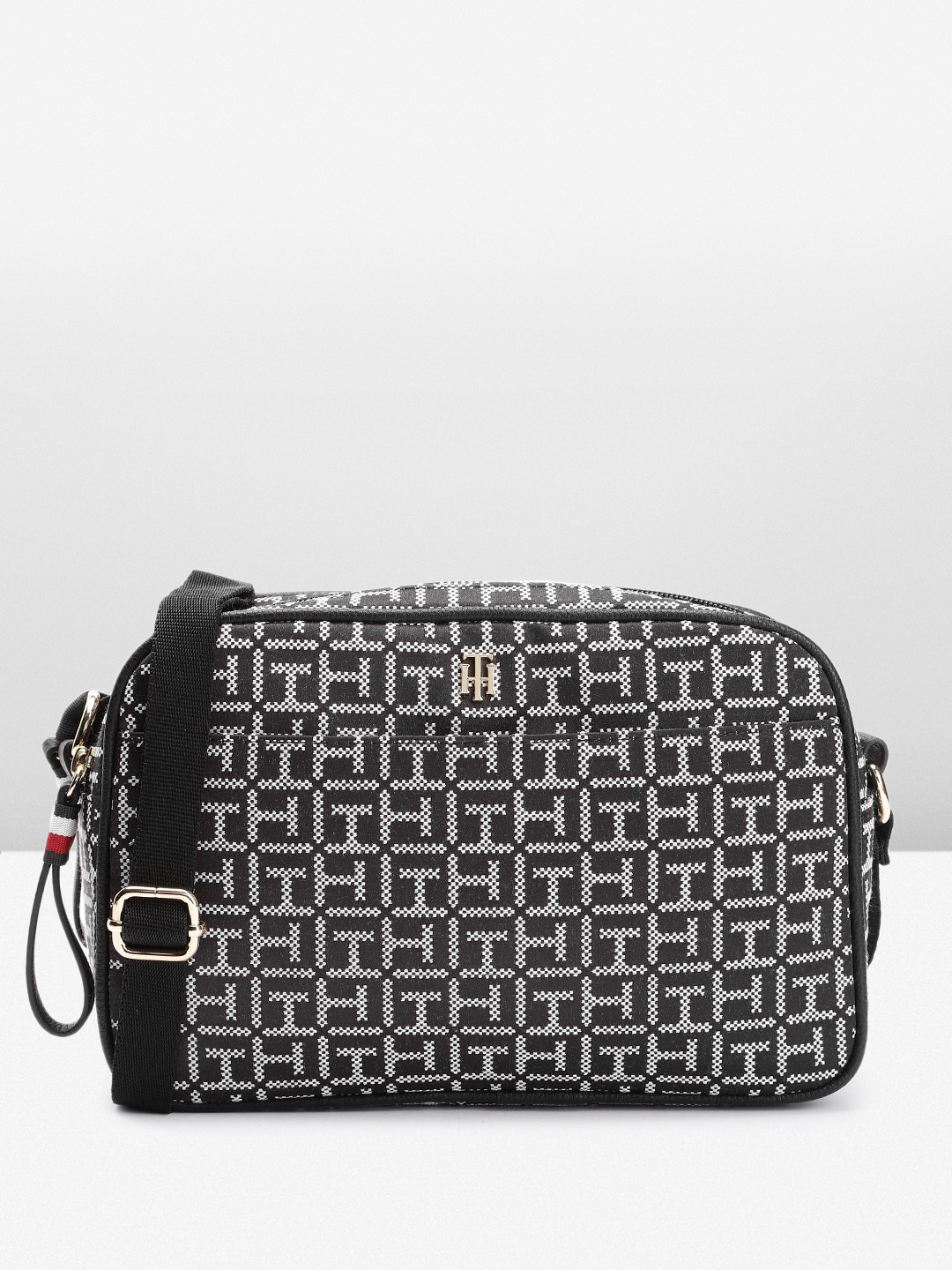 

Tommy Hilfiger CYNTHIA II Brand Logo Printed Sling Bag, Black