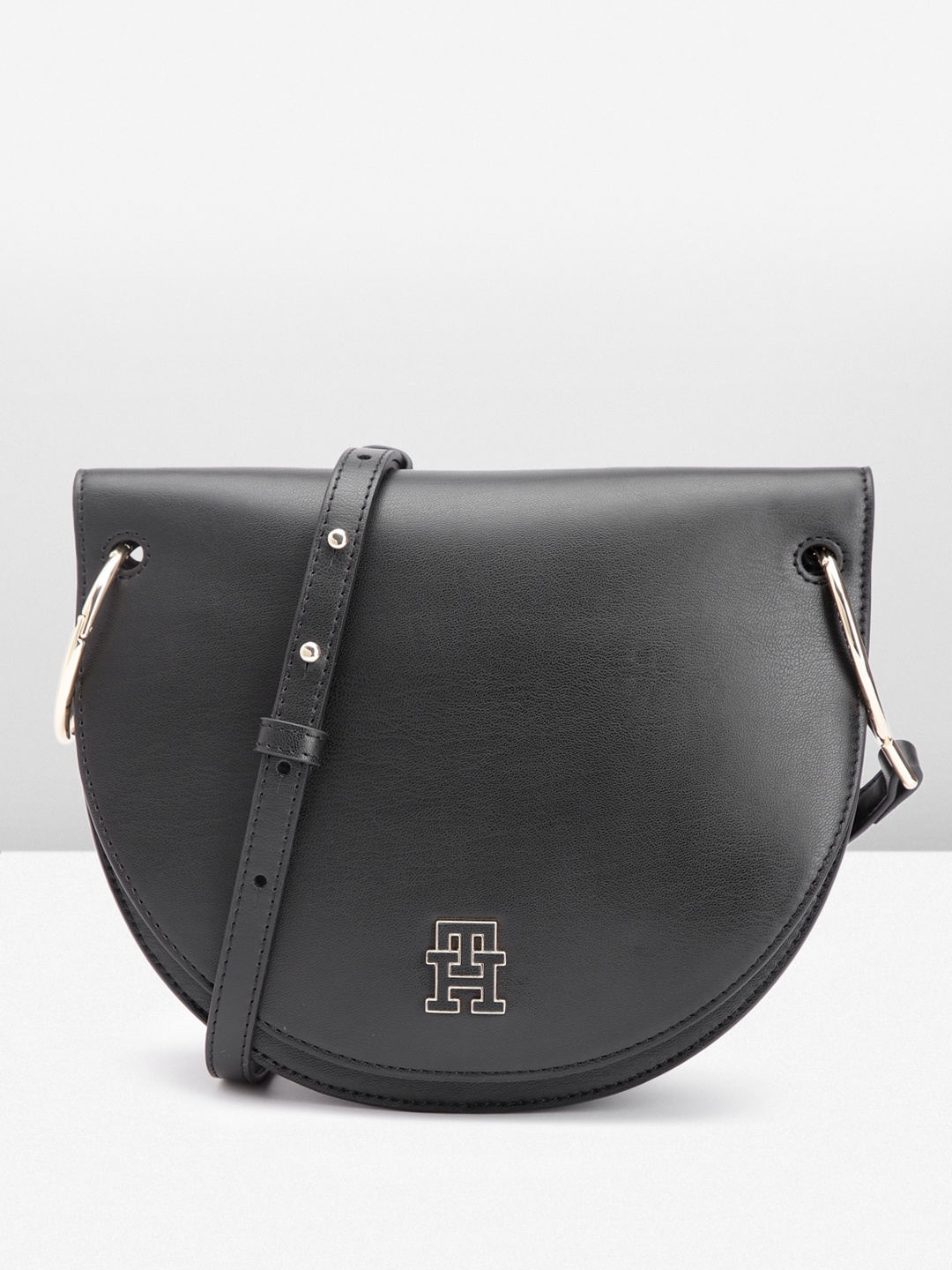 

Tommy Hilfiger Solid PU Half Moon Sling Bag, Black