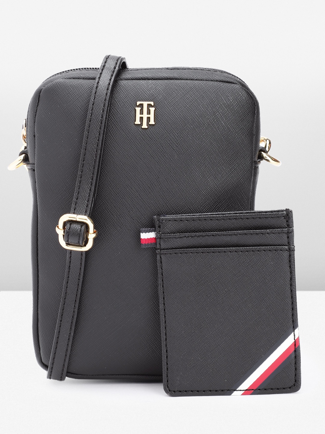 

Tommy Hilfiger Women Solid Sling Bag, Black