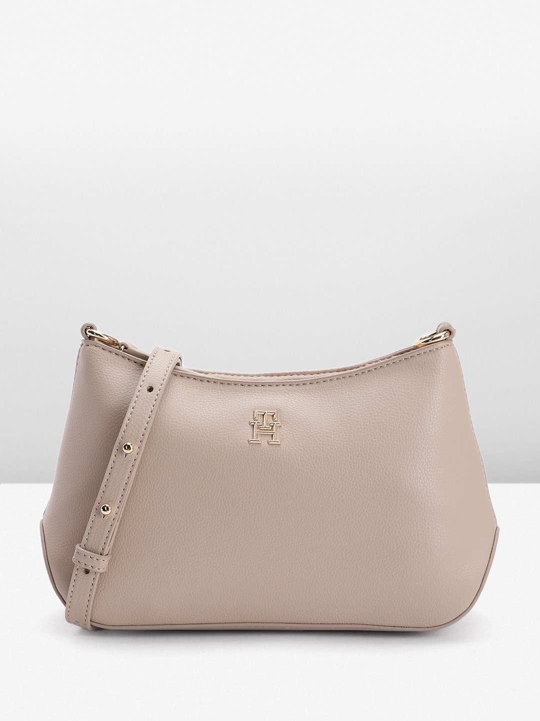 

Tommy Hilfiger Solid PU Structured Sling Bag, Beige
