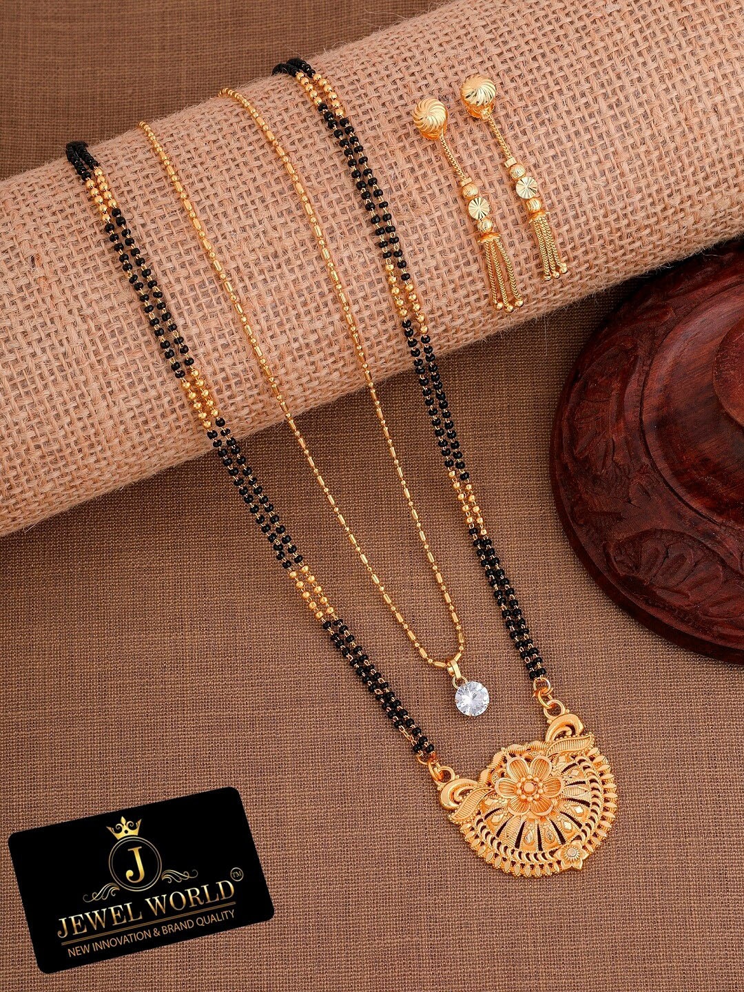

JEWEL WORLD Gold-Plated Stone Studded & Beaded Mangalsutra With Chain & Earrings