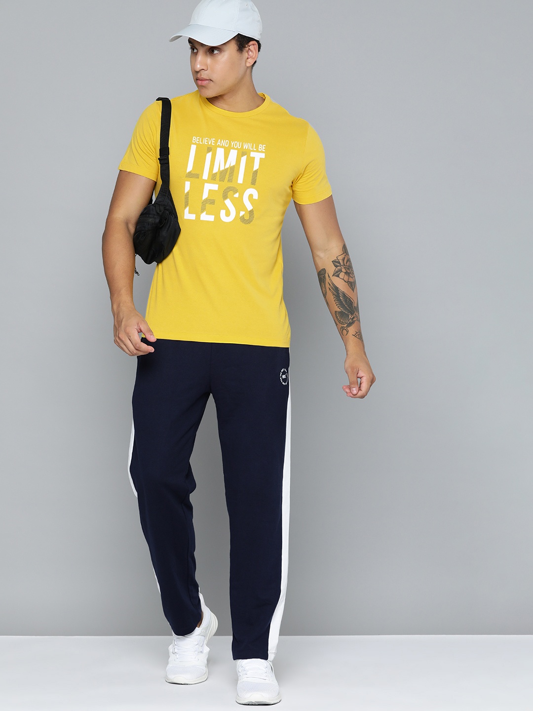 

HRX by Hrithik Roshan Typography Printed Pure Cotton T-shirt, Yellow