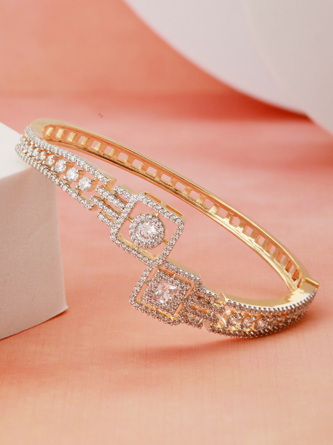 

Saraf RS Jewellery Gold-Plated American Diamond Studded Bangle-Style Bracelet