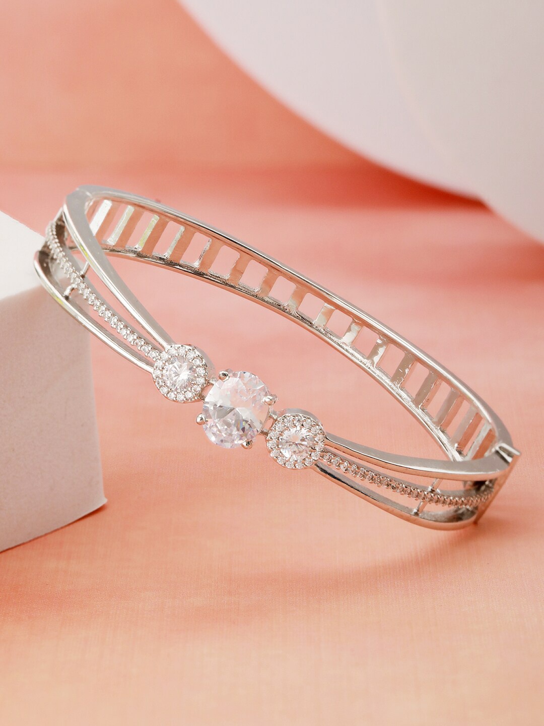 

Saraf RS Jewellery Silver-Plated American Diamond Studded Bangle-Style Bracelet