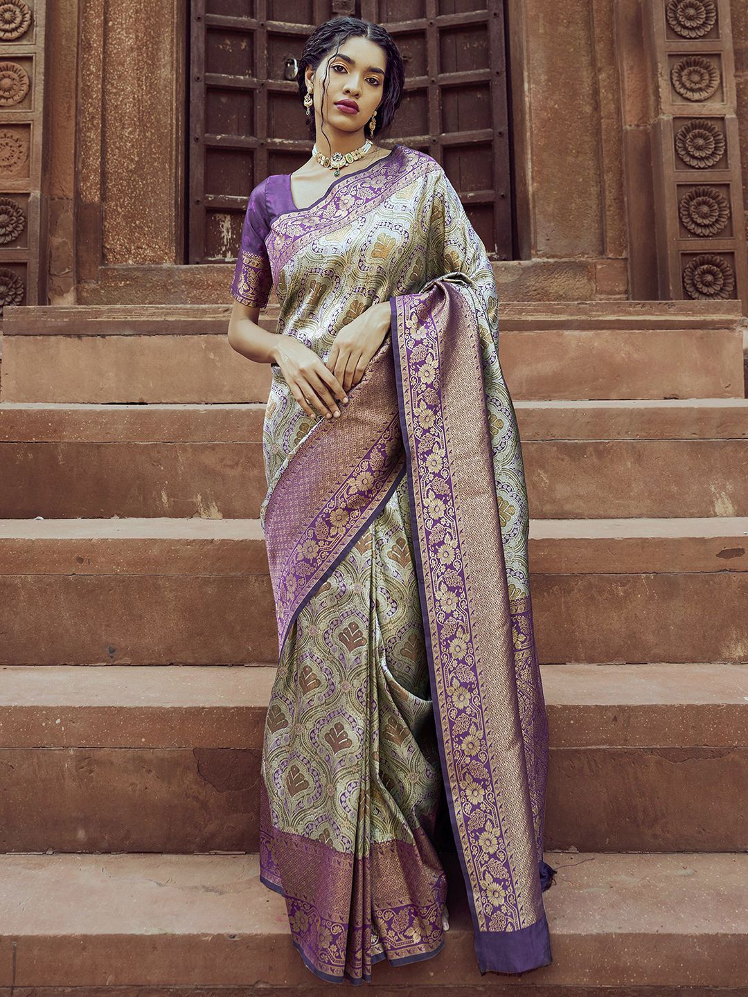 

Mitera Purple & Green Ethnic Motifs Woven Design Zari Kanjeevaram Saree