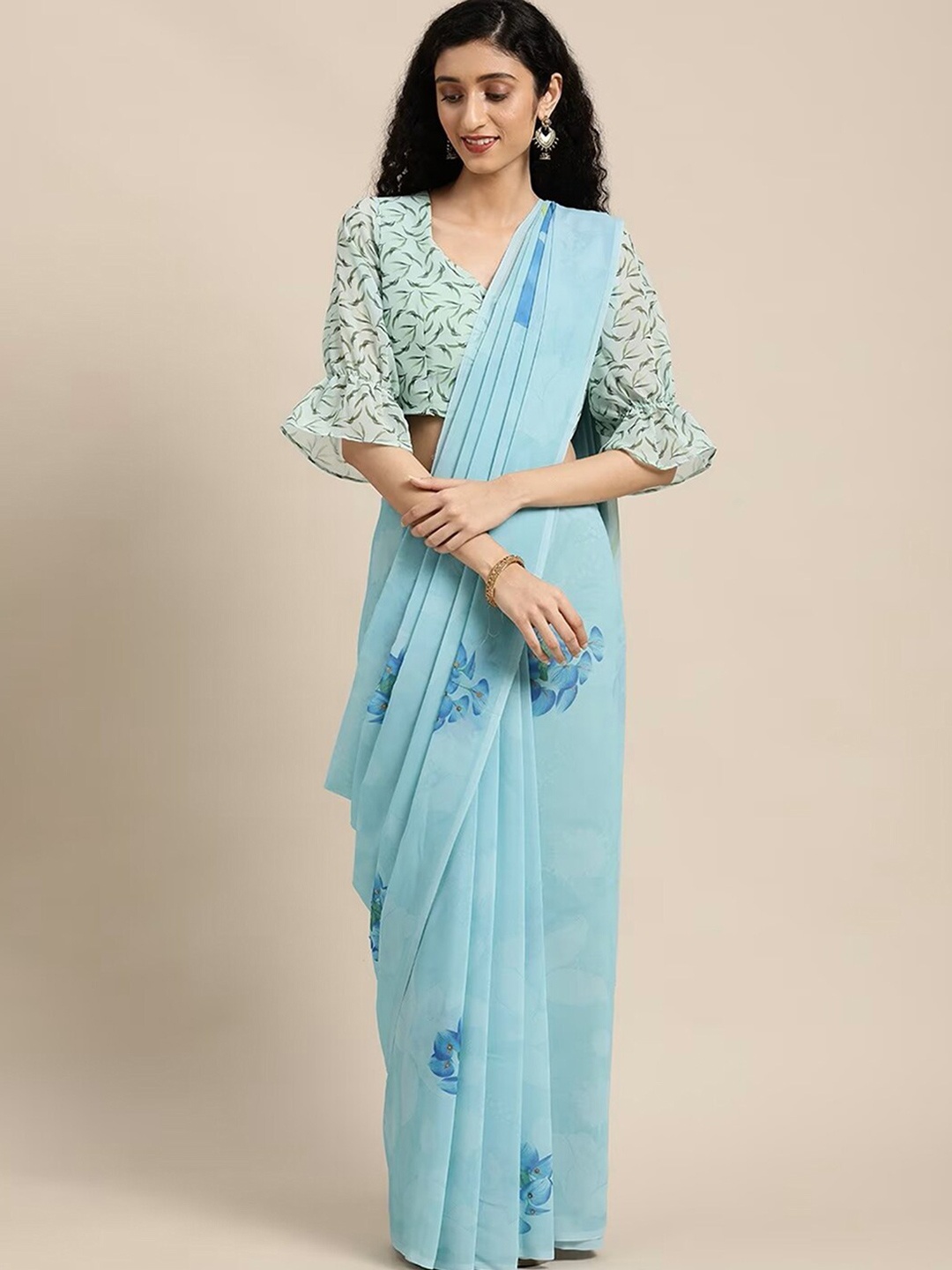

Mitera Turquoise Blue Floral Embellished Saree