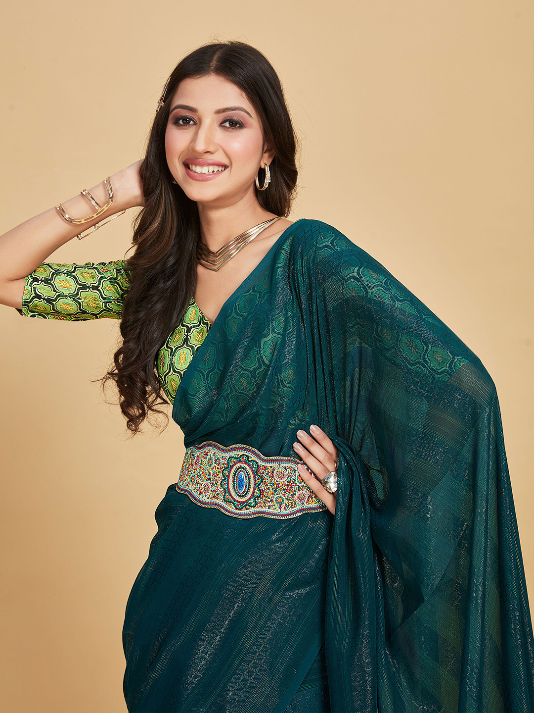 

Sangria Teal Green Striped Saree