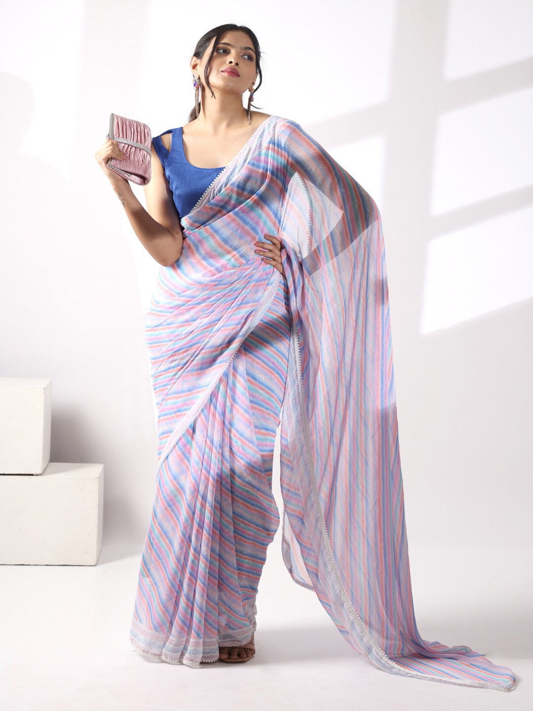 

Atulyam Tex World Striped Poly Georgette Saree, Purple