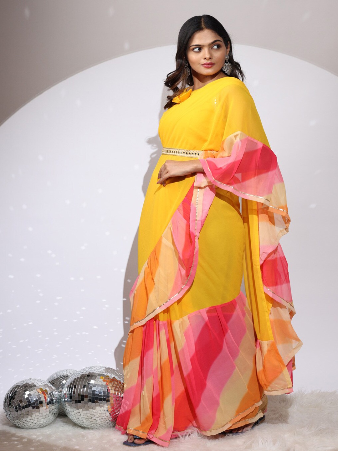 

Atulyam Tex World Poly Georgette Saree, Yellow