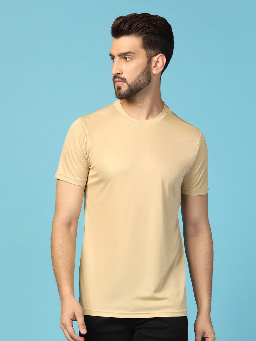 

INKKR Men Solid Round Neck T-shirt, Beige