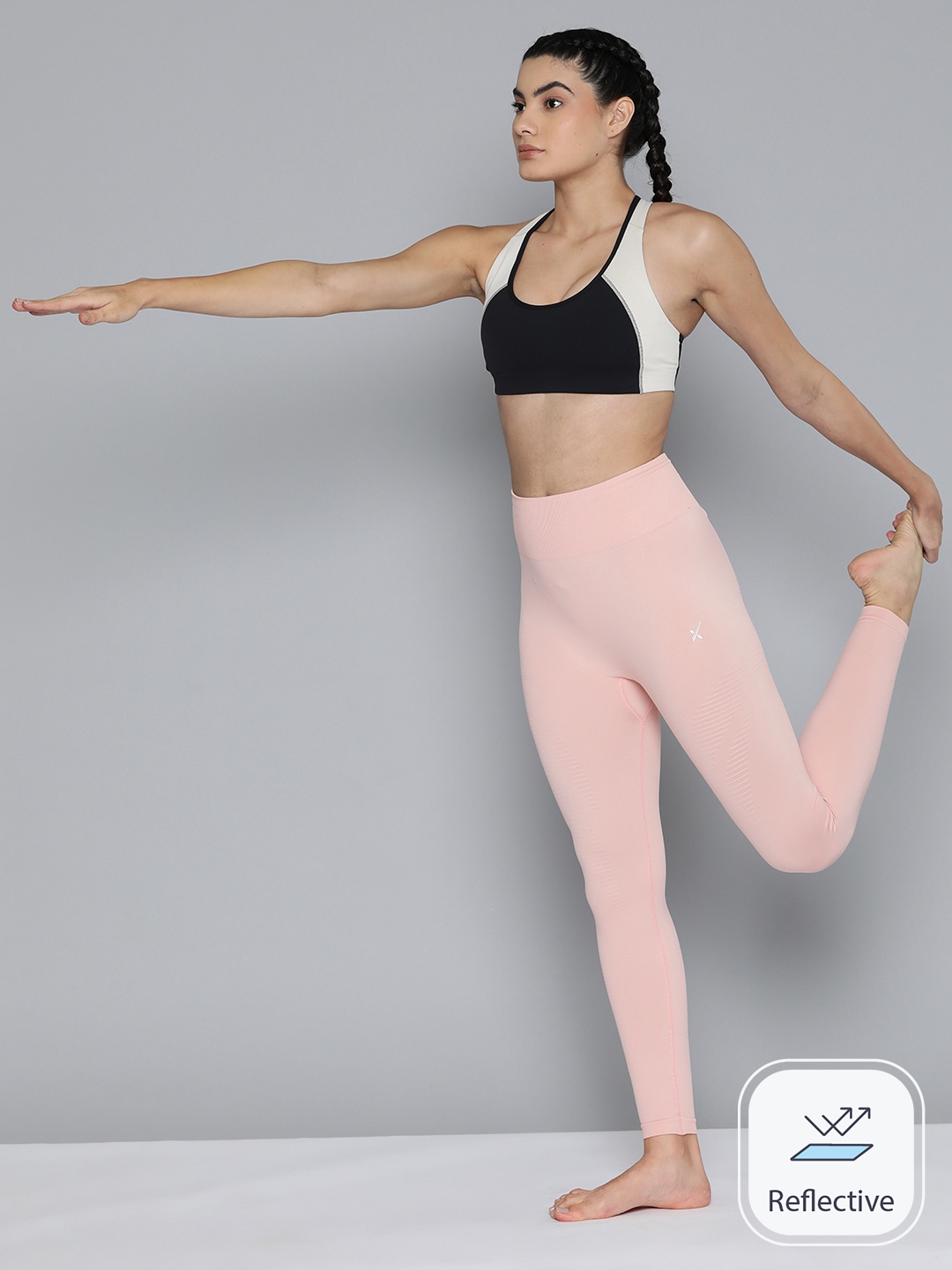 

HRX by Hrithik Roshan Women Striped Seamless Rapid-Dry Yoga Tights, Peach