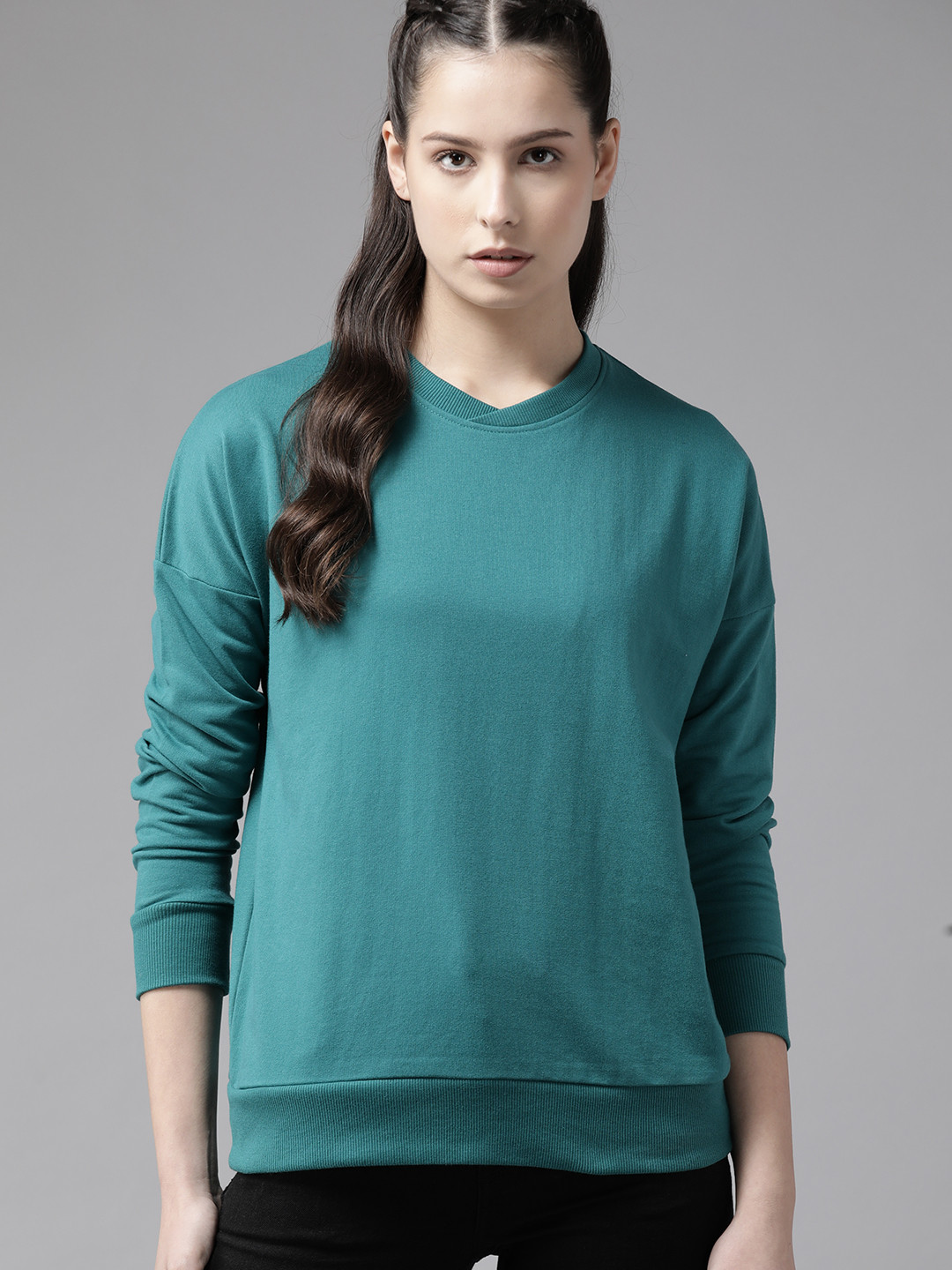 

Roadster Women Solid Longline Sweatshirt, Teal