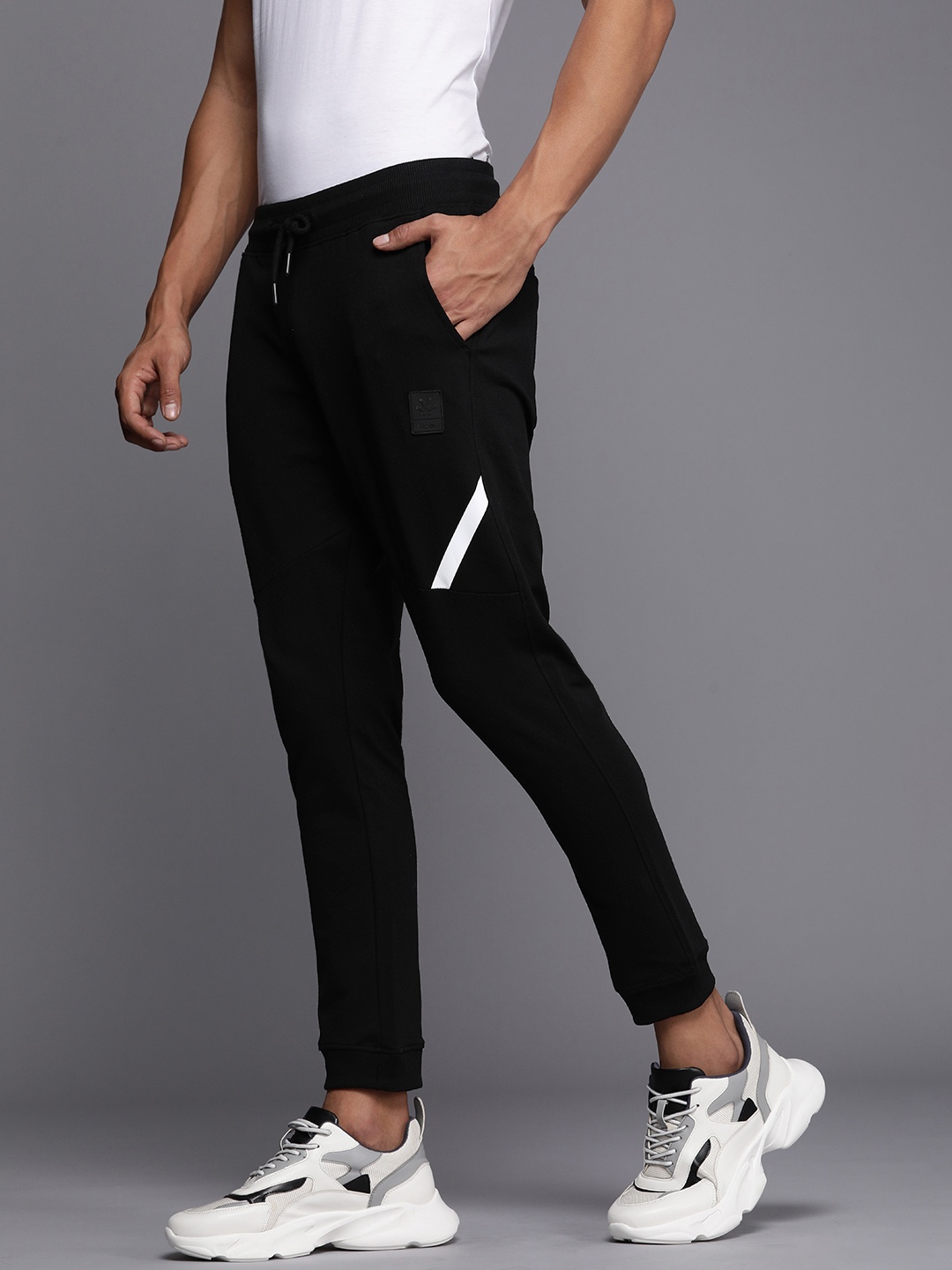 

WROGN Men Mid-Rise Joggers With Drawcords Closure & Striped detail, Black