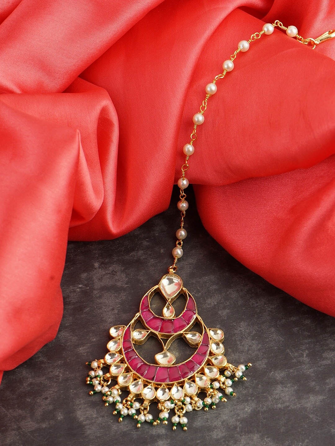 

AURAA TRENDS Gold-Plated Kundan Studded Maang Tikka, Red
