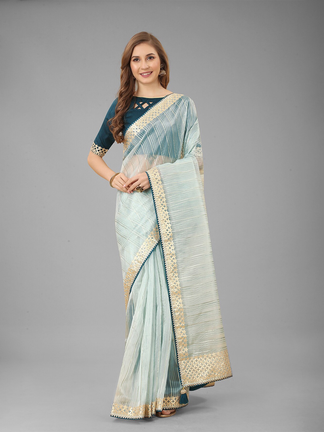 

N N ENTERPRISE Blue & Gold-Toned Striped Embroidered Net Saree