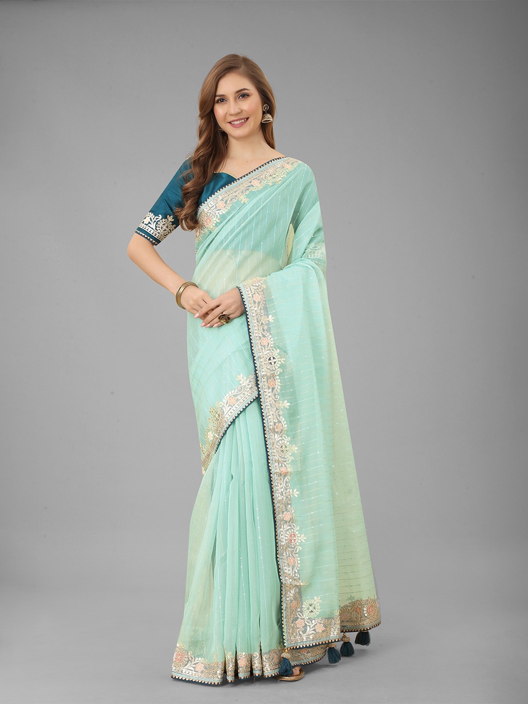 

N N ENTERPRISE Embellished Embroidered Net Saree, Sea green