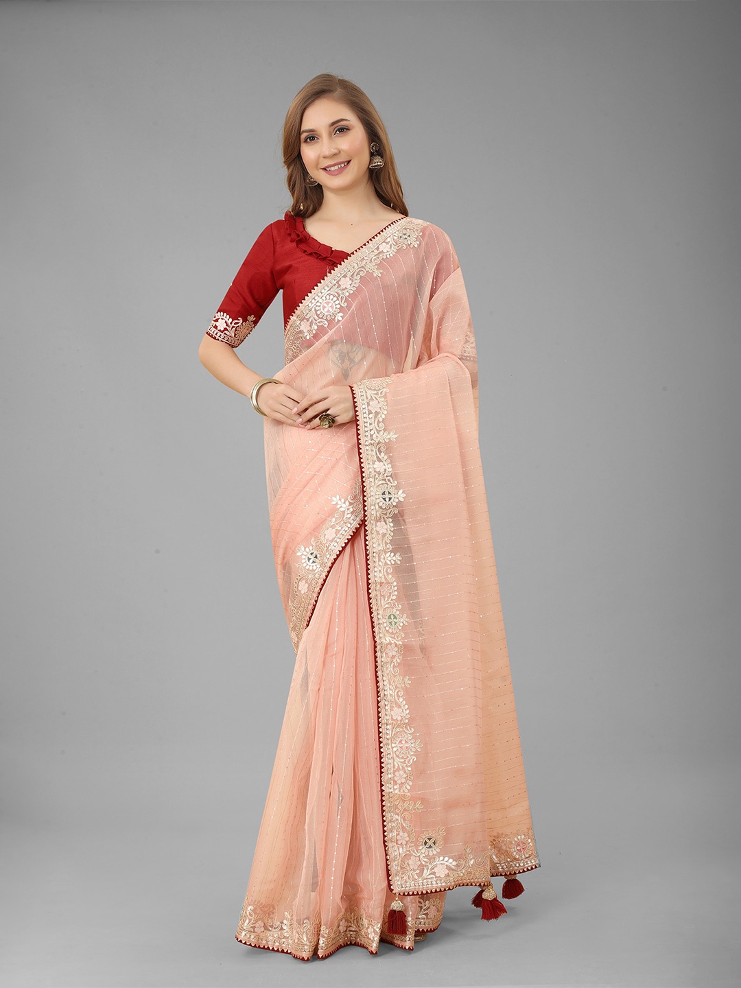 

N N ENTERPRISE Embellished Embroidered Net Saree, Peach