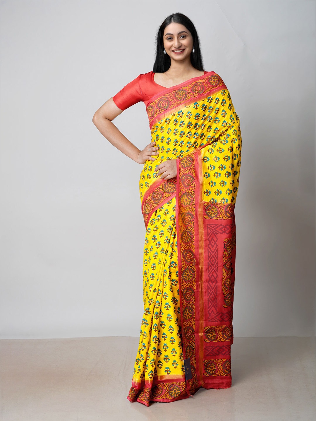 

Unnati Silks Ethnic Motifs Printed Saree, Yellow