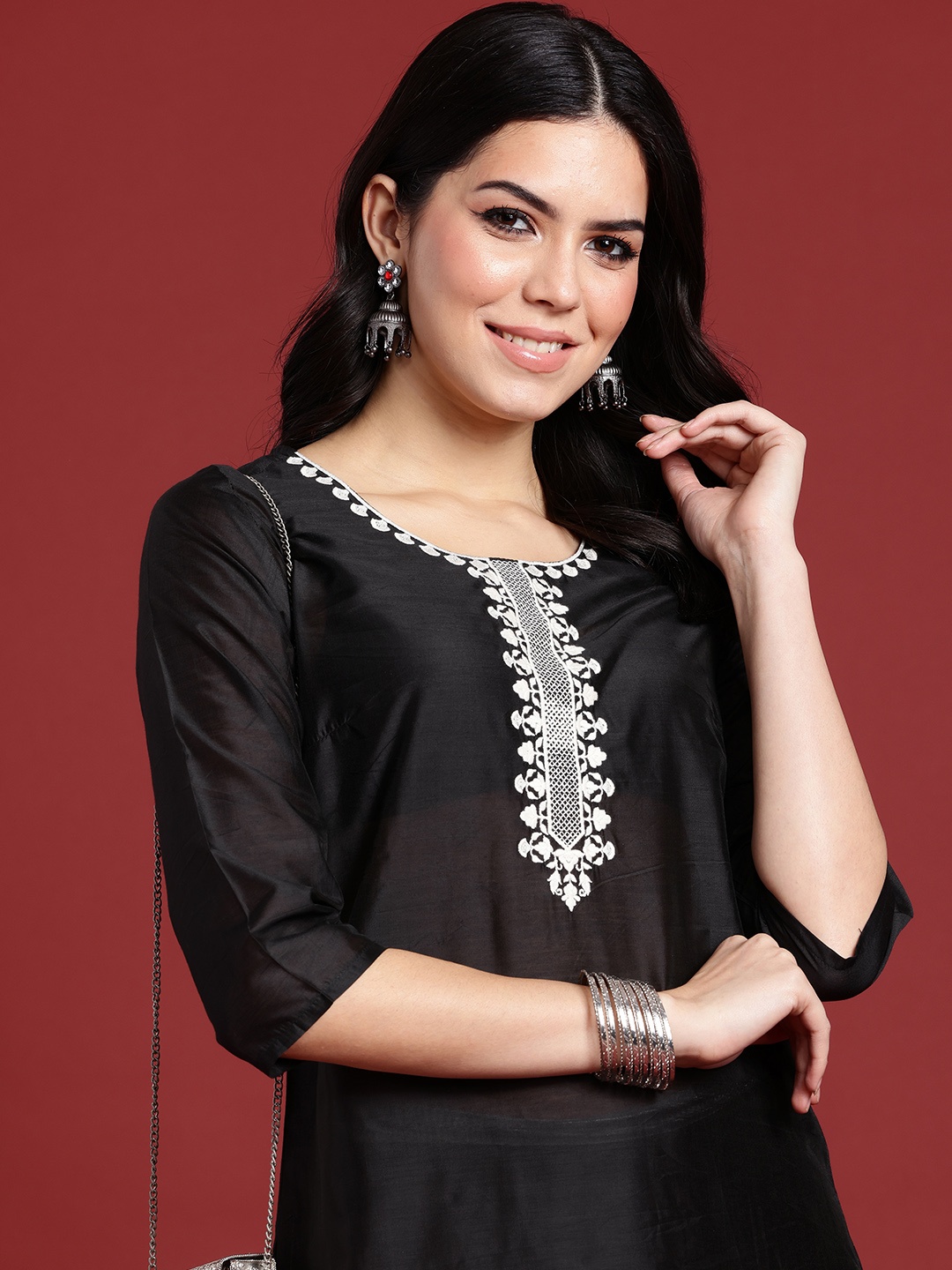 

Anouk Women Ethnic Motifs Yoke Design Thread Work Kurta with Trousers, Black