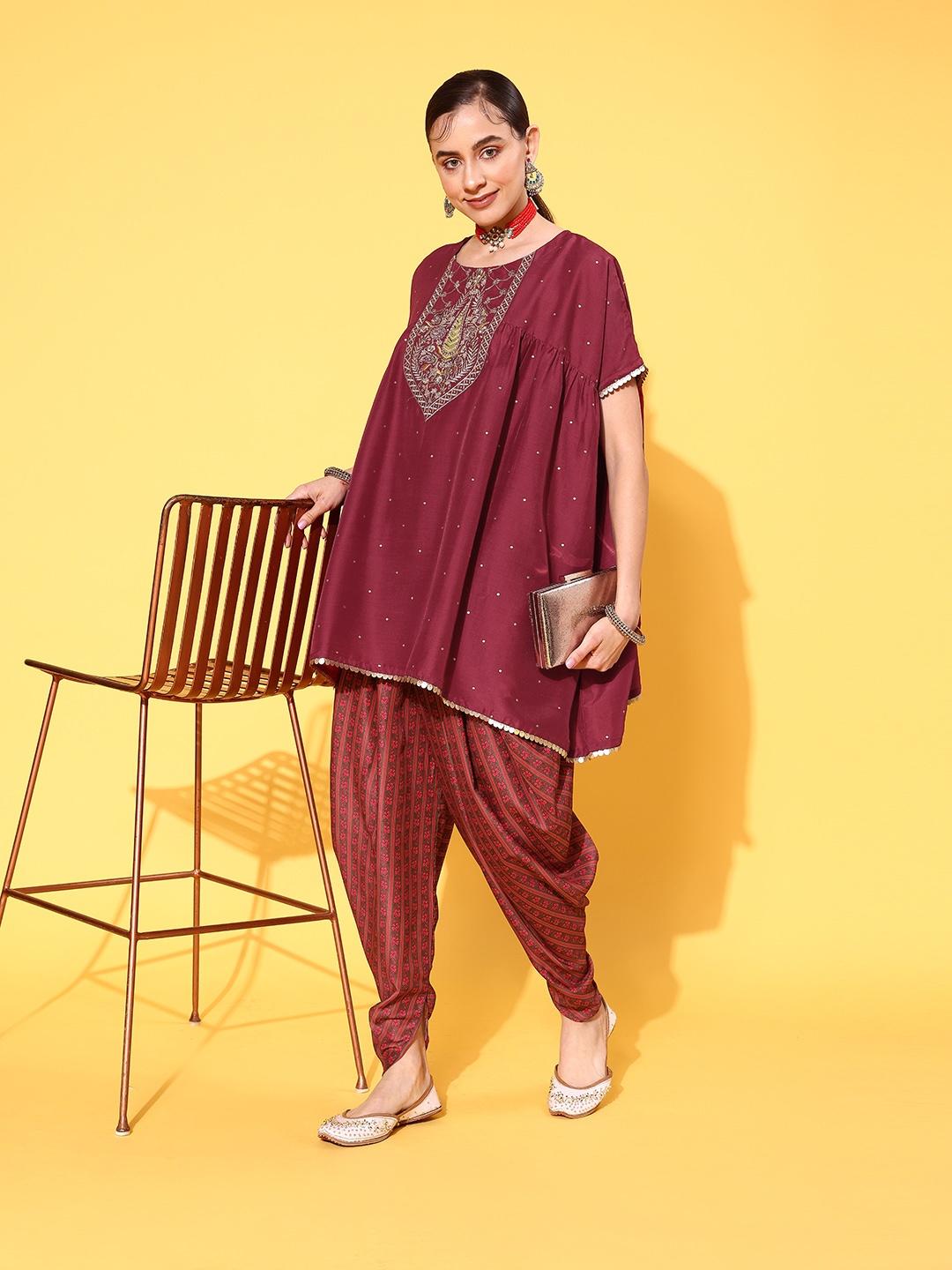 

Sangria Women Ethnic Motifs Embroidered Sequinned Kurta with Dhoti Pants, Maroon