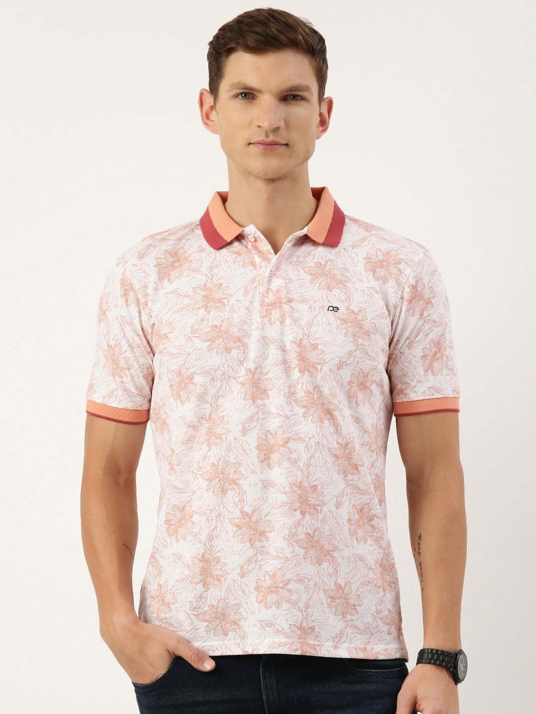 

Peter England Men Floral Printed Polo Collar T-shirt, Peach