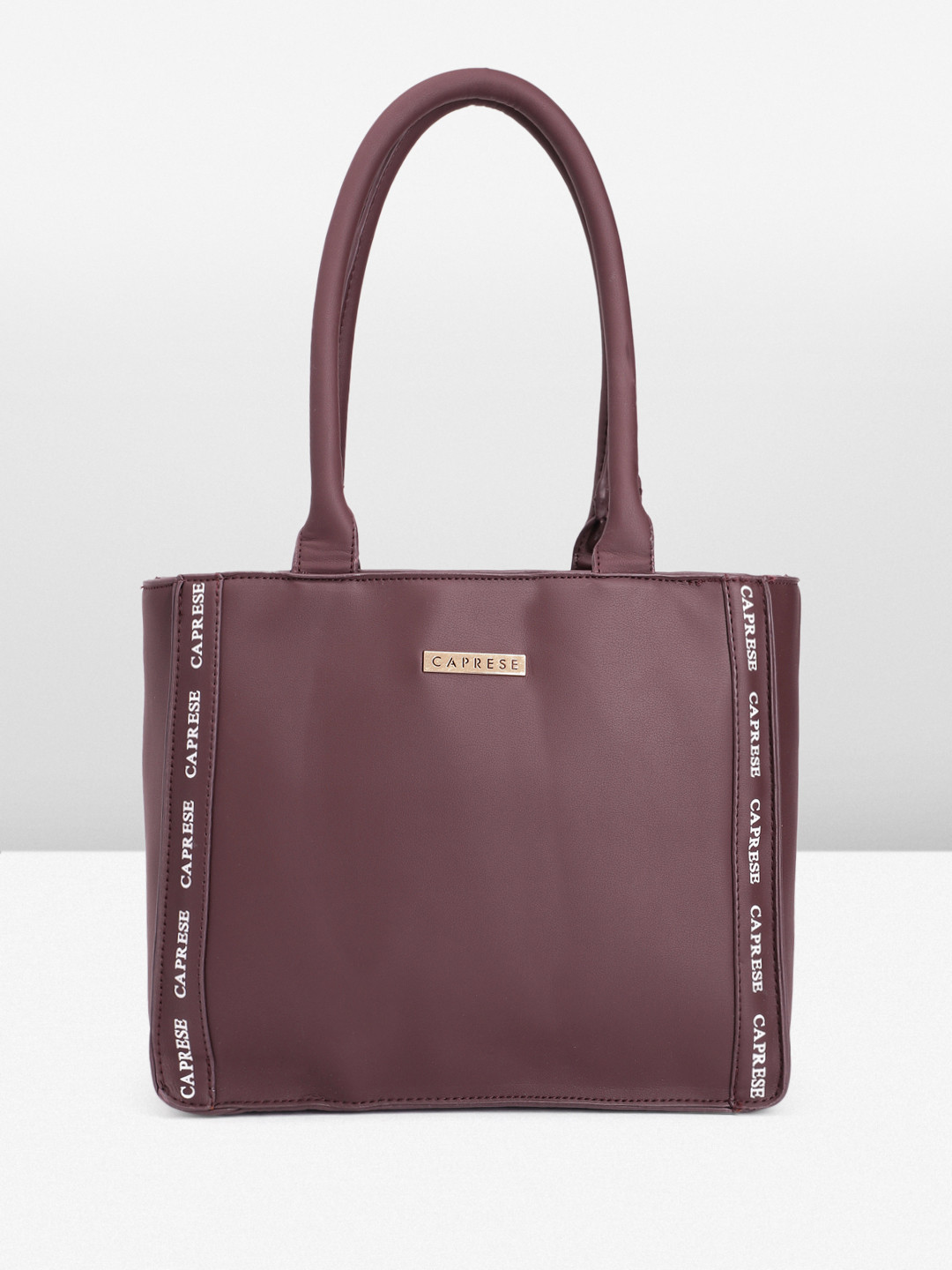 

Caprese Women Solid Shoulder Bag, Burgundy