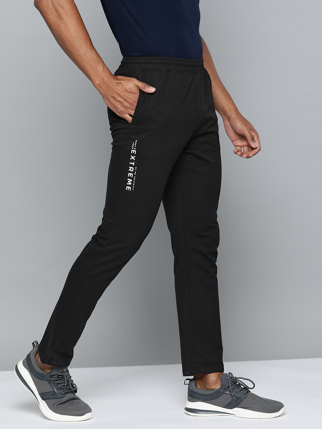 

HRX by Hrithik Roshan Men Printed Detail Mid-Rise Regular Fit Lifestyle Trackpants, Black