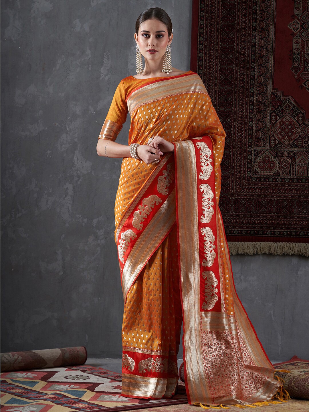 

Mitera Orange & Gold-Toned Ethnic Motifs Woven Design Zari Silk Blend Banarasi Saree
