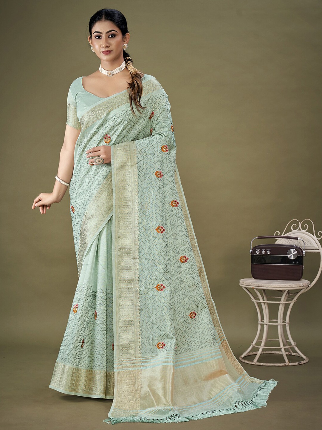 

Mitera Blue & Red Ethnic Motifs Embroidered Zari Organza Saree