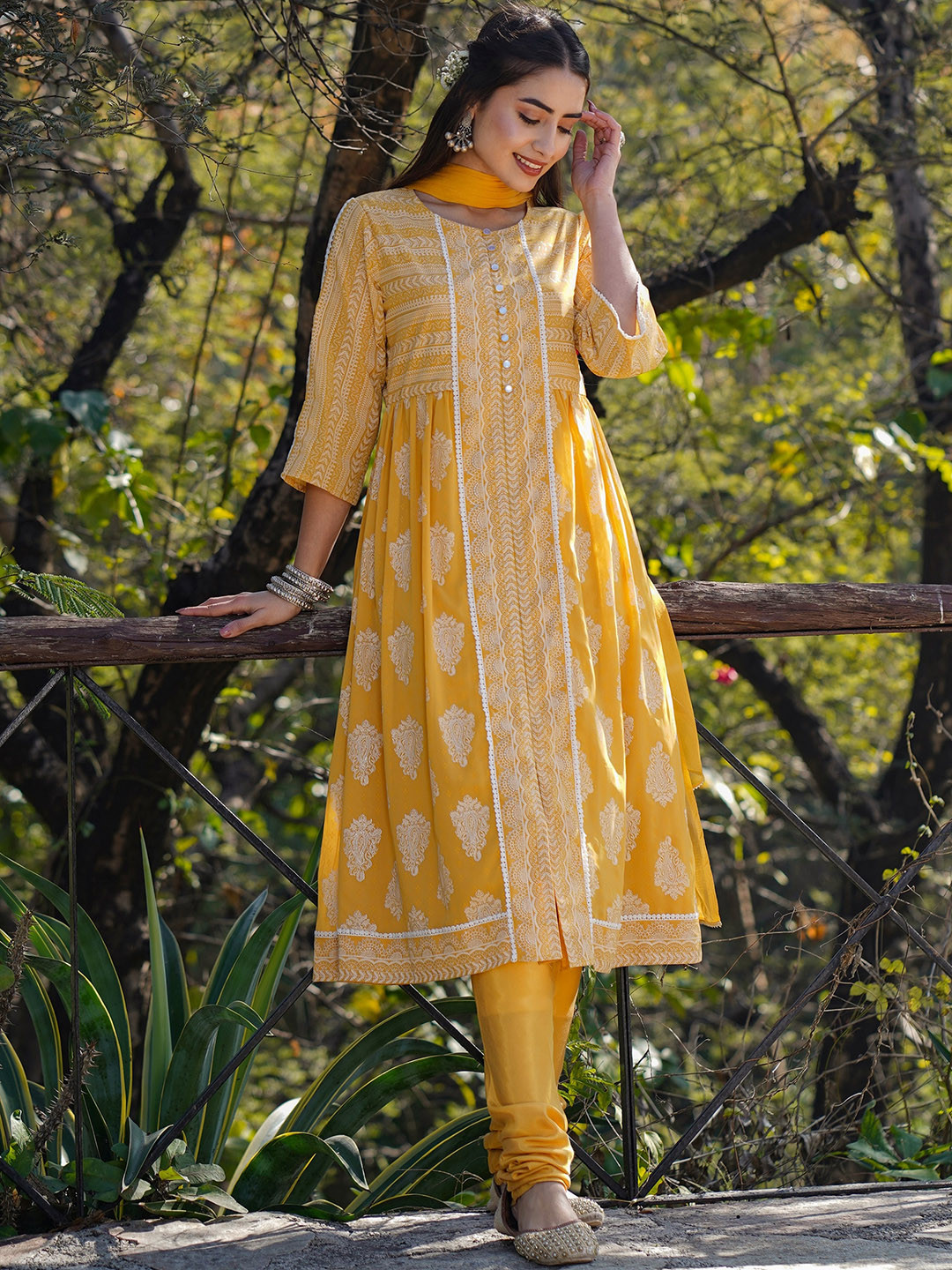 

Juniper Ethnic Motifs Printed Panelled Kurta with Churidar & Dupatta, Yellow