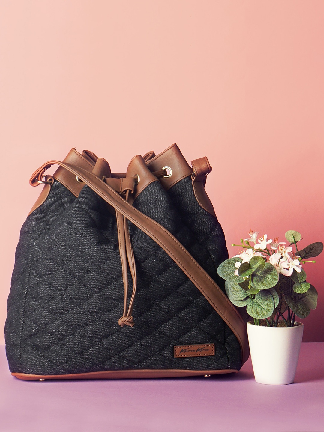 

Kanvas Katha Textured Bucket Sling Bag with Quilt, Black
