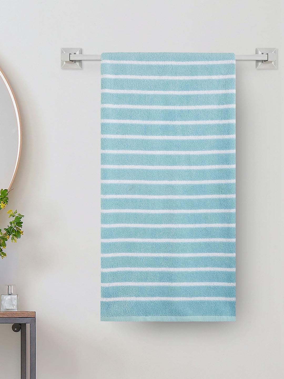 

Home Centre Color Refresh Essence Blue & White Striped 500 GSM Cotton Bath Towel