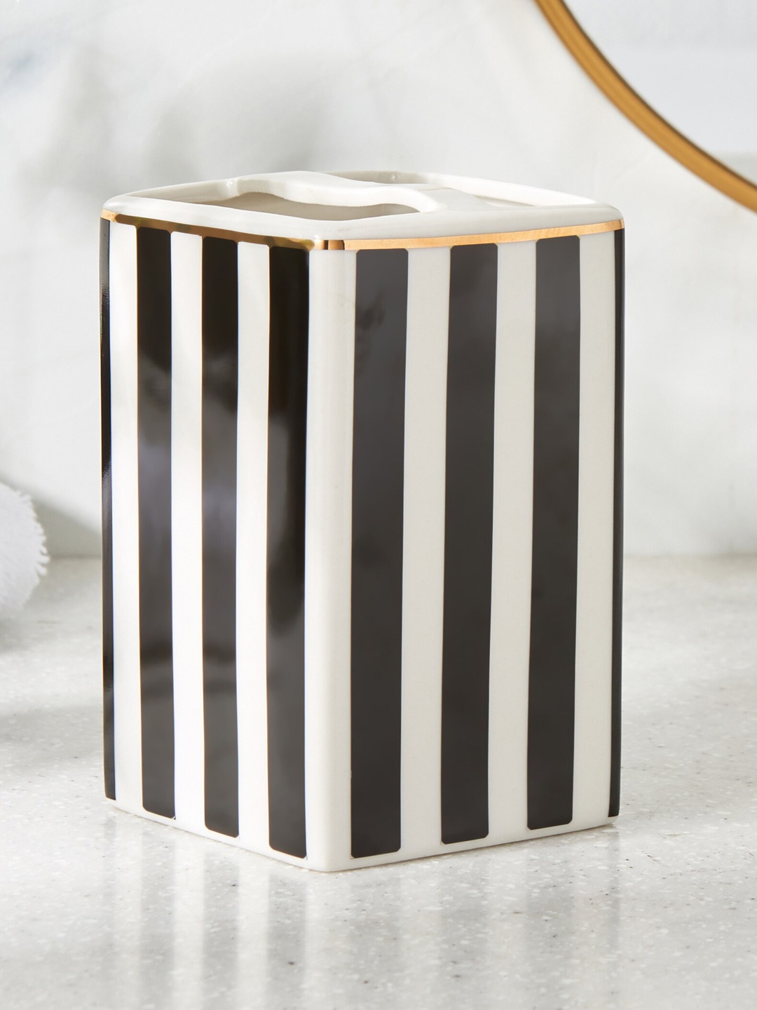 

Home Centre Aubree Black & White Striped Ceramic Tooth Brush Holder
