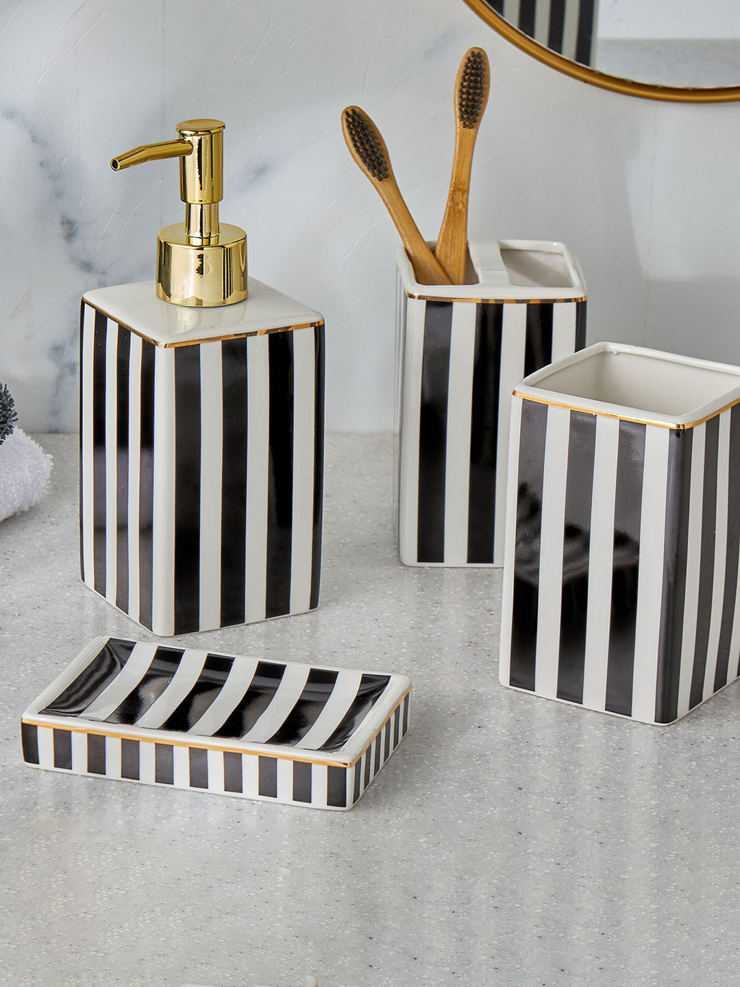 

Home Centre Aubree Black & White Striped Ceramic Soap Dish