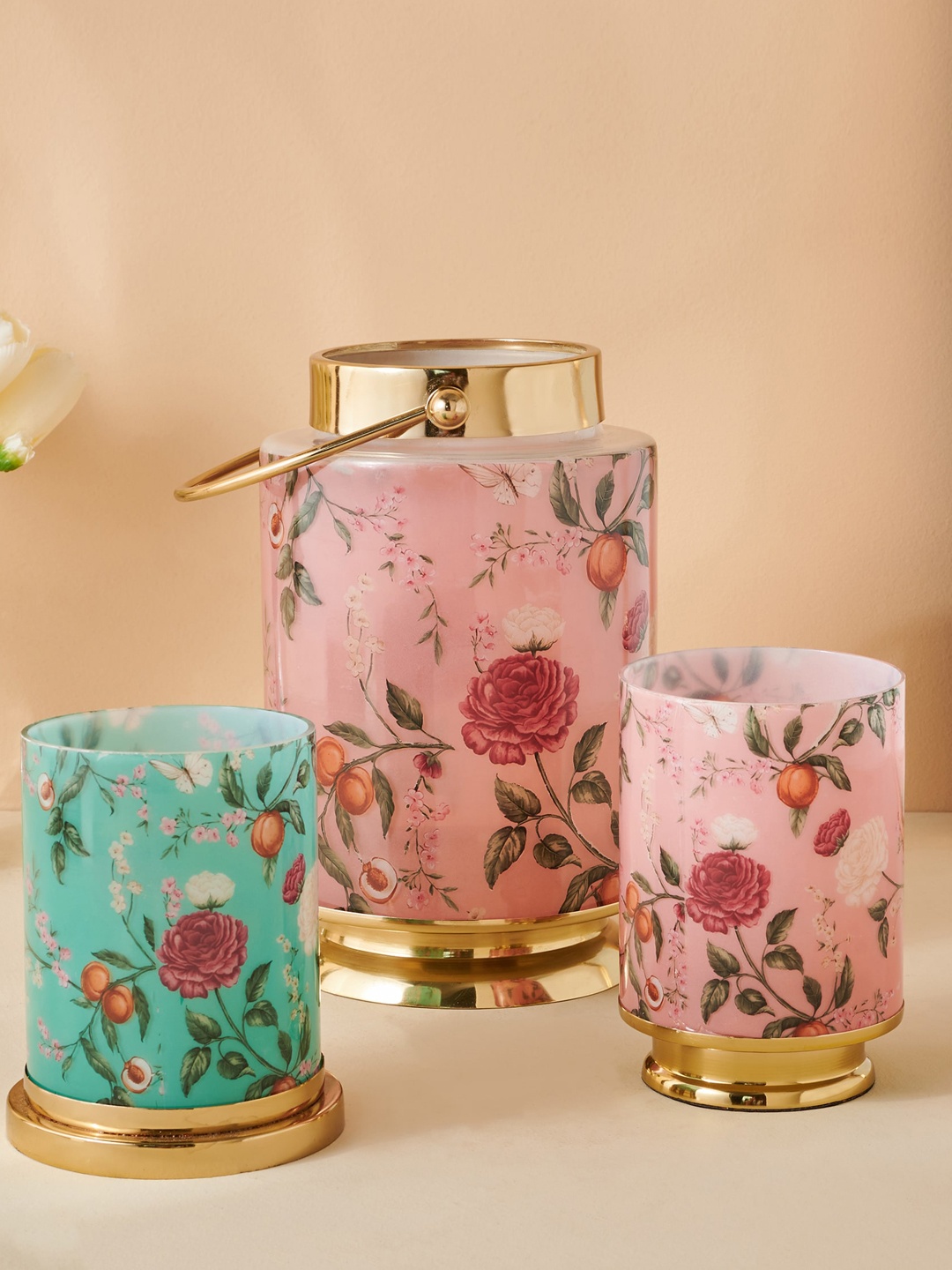 

Home Centre Hoovu Pink & Gold-Toned Printed Glass Candle Holder With Metal Base