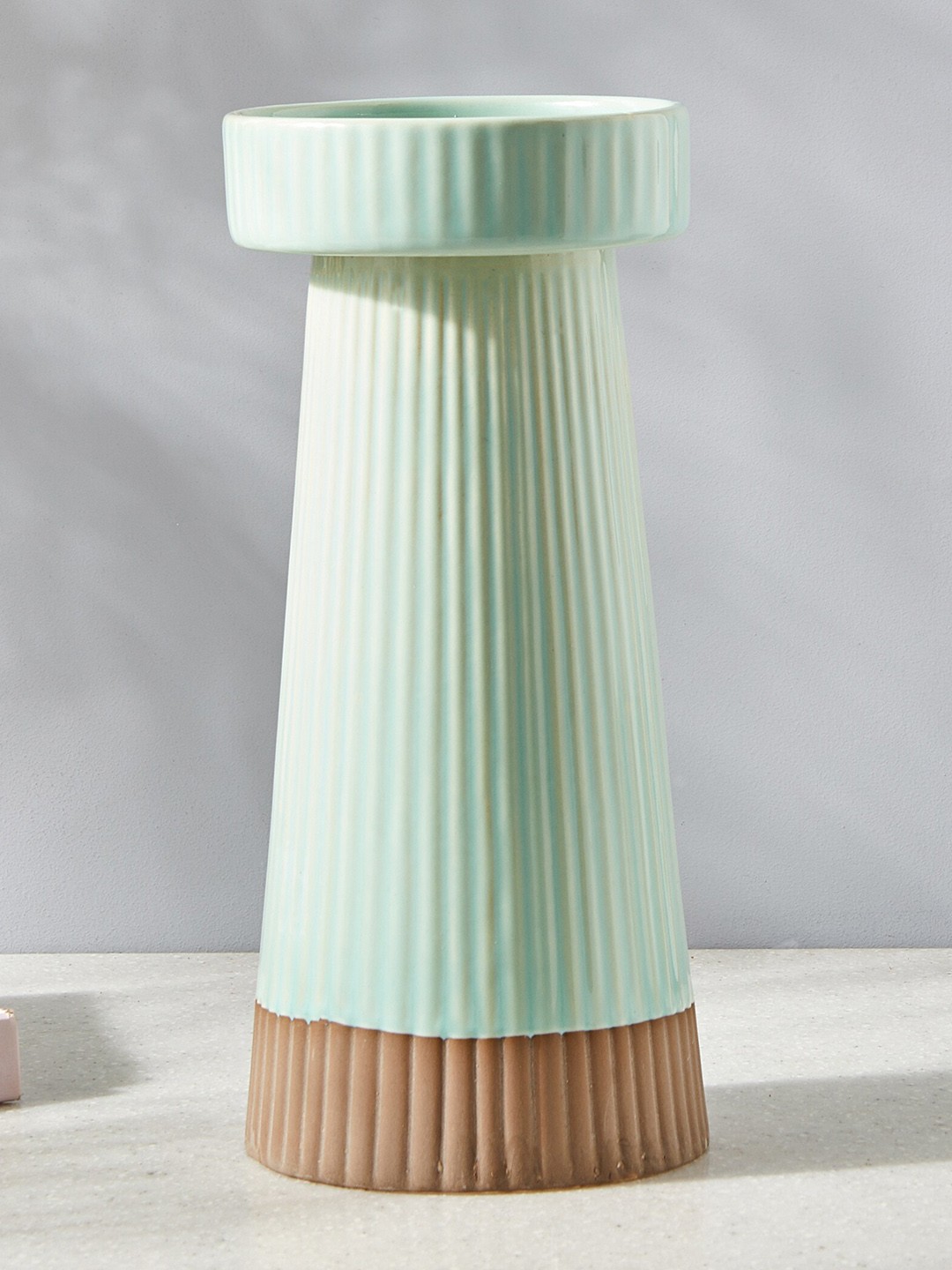 

Home Centre Turquoise Blue & Brown Textured Ceramic Tall Candle Holder
