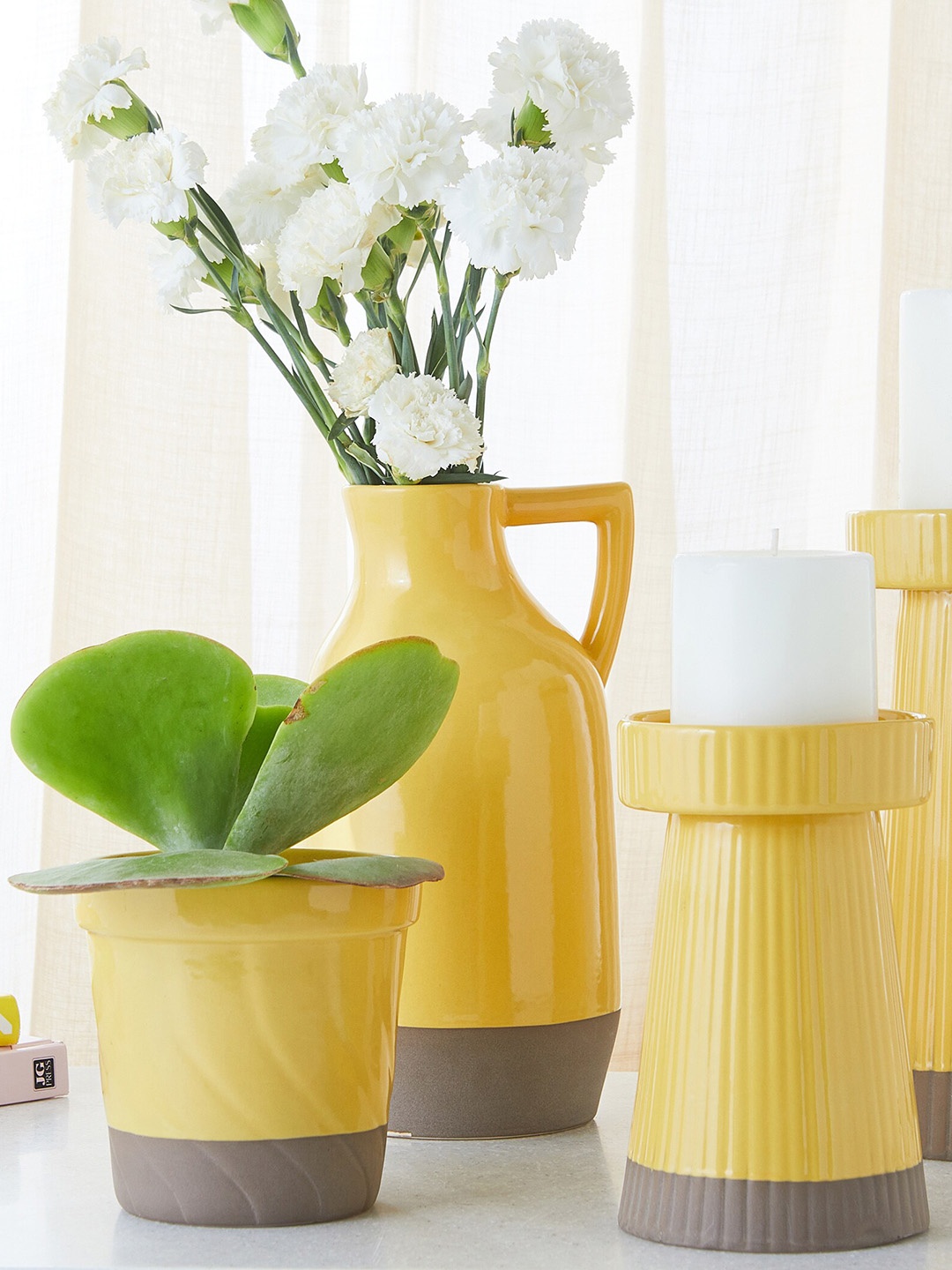 

Home Centre Colour Refresh Yellow & Brown Striped Tall Candle Holder