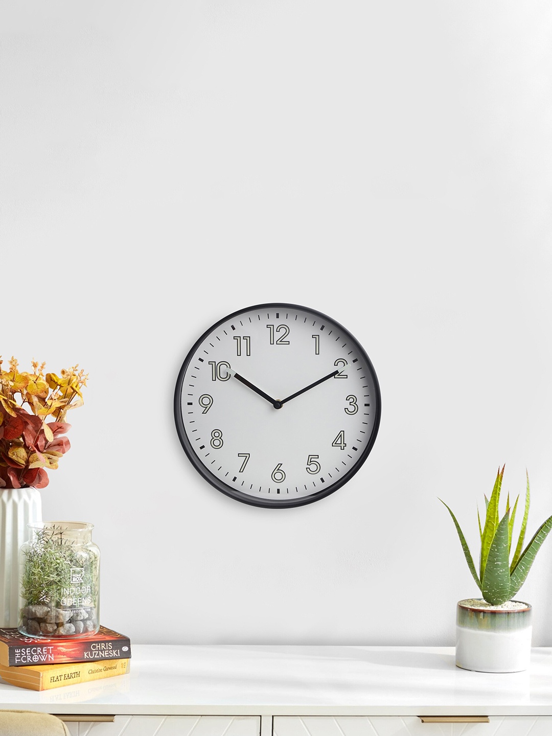 

Home Centre Casablanca White & Black Printed Contemporary Wall Clock