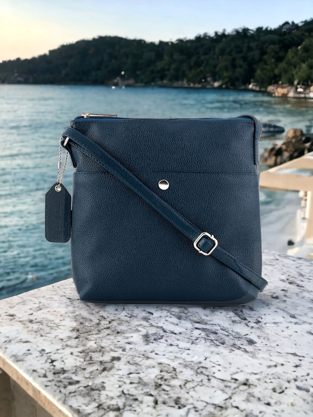 

Mast & Harbour Blue Textured Structured Sling Bag With Tasselled