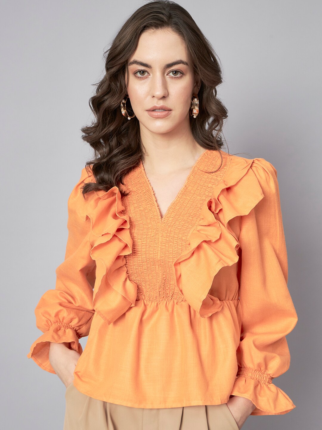 

The Dry State Orange V-Neck Ruffles Peplum Top