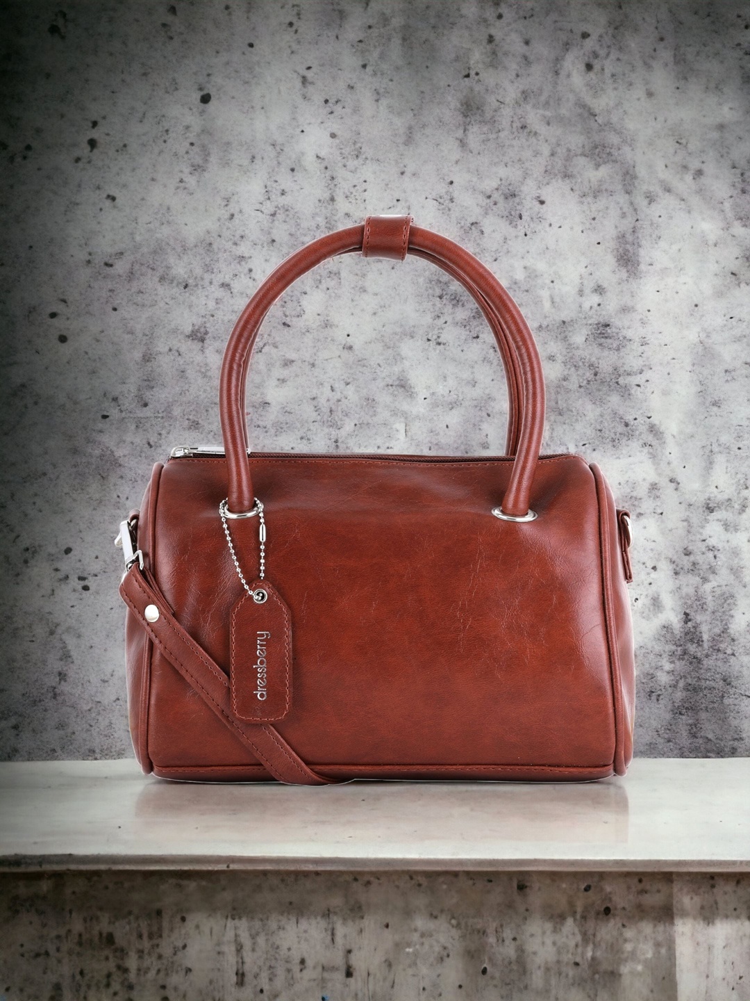 

DressBerry Brown Textured Bowling Handheld Bag