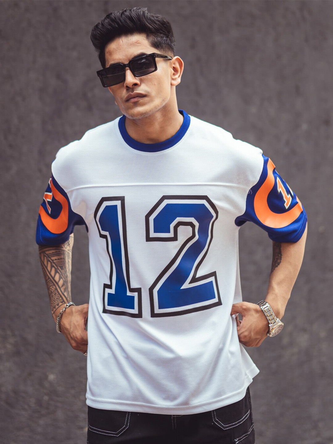 

Powerlook White Varsity Printed Drop-Shoulder Sleeves Oversized T-Shirt