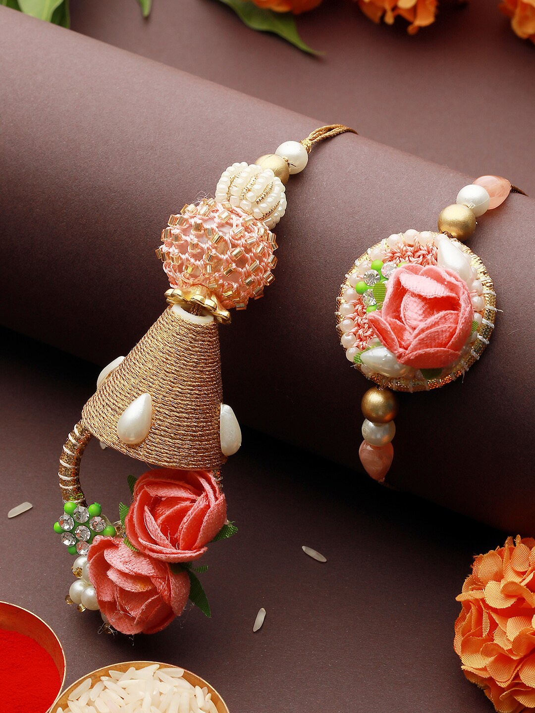 

Priyaasi Set Of 2 Floral Bell Bhaiya Bhabhi Rakhi Set, Pink