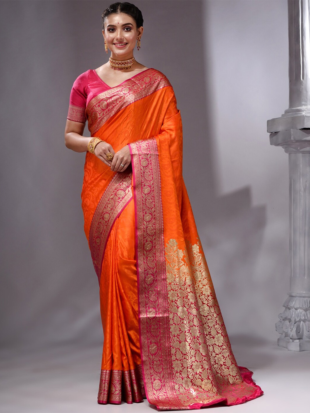 

HOUSE OF BEGUMEthnic Motifs Woven Design Zari Banarasi Saree, Orange