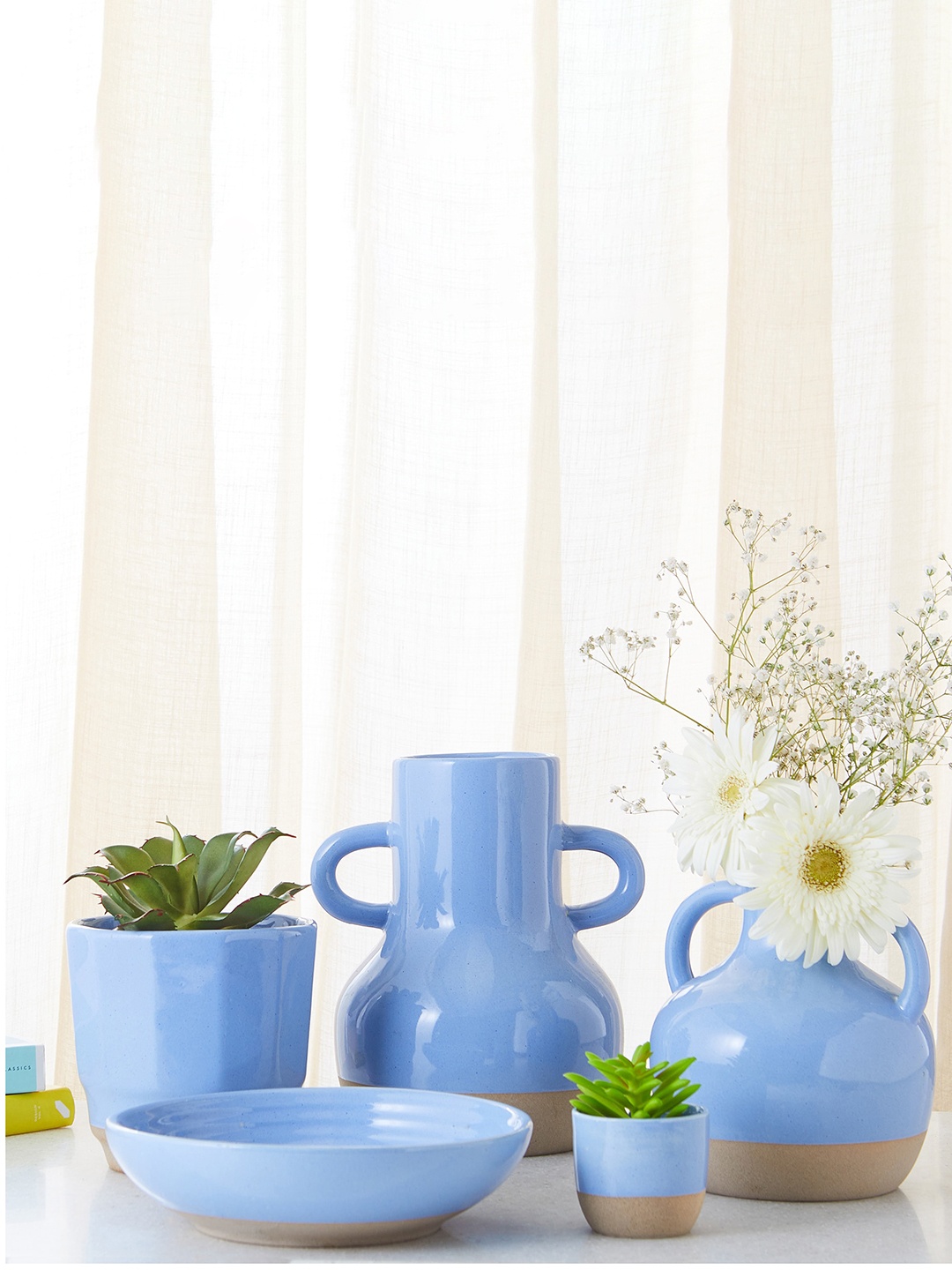 

Home Centre Colour Refresh Blue Ceramic Jug Planter