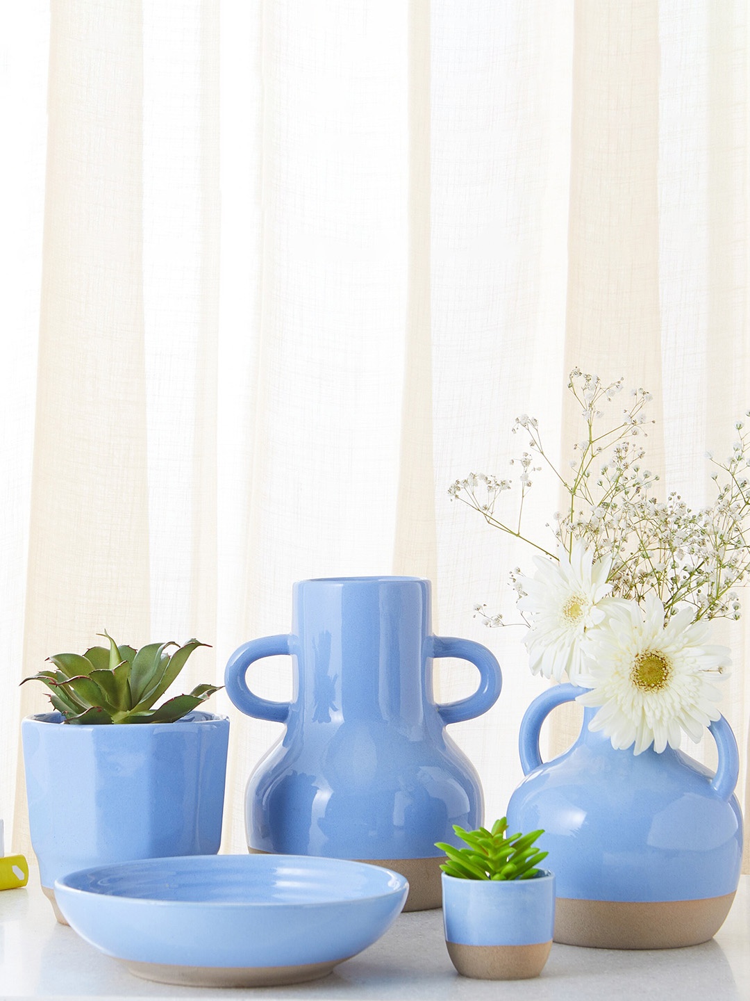 

Home Centre Blue Ceramic Ribbed Round Serving Bowl