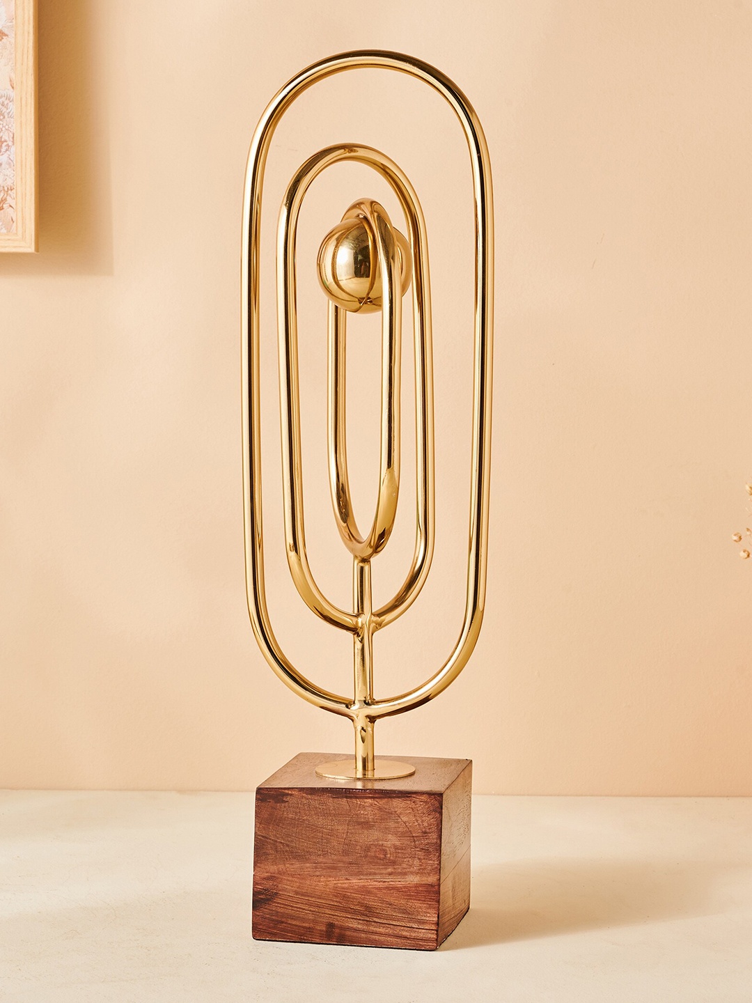 

Home Centre Splendid Dastkari Gold-Toned Textured Splendid Duskeri Figurine Showpiece