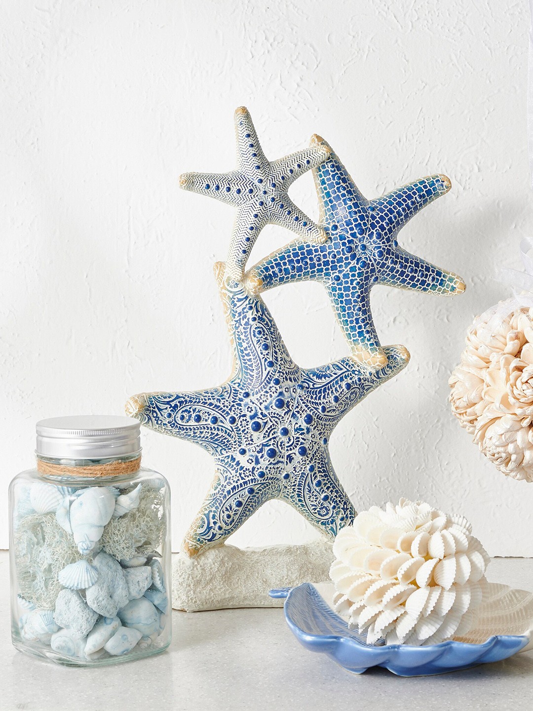 

Home Centre Blue Decorative Shell Jar Showpiece