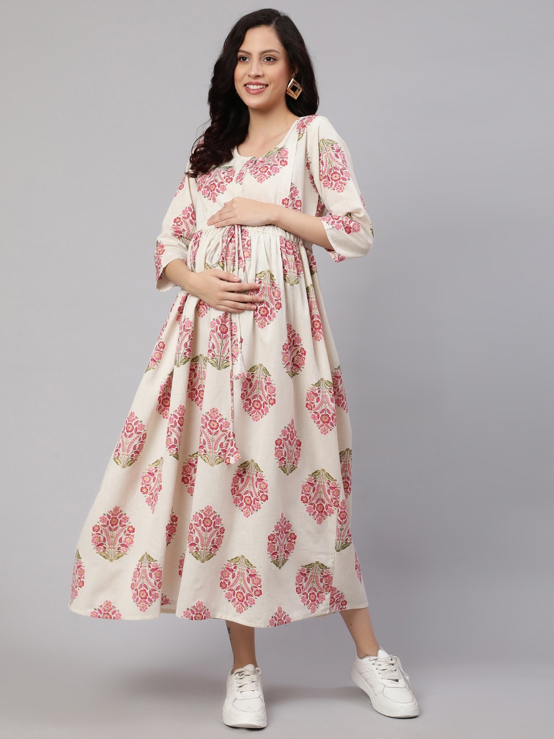 

Nayo Off White Floral Printed Round Neck Tie Up Cotton Fit & Flare Maternity Dress