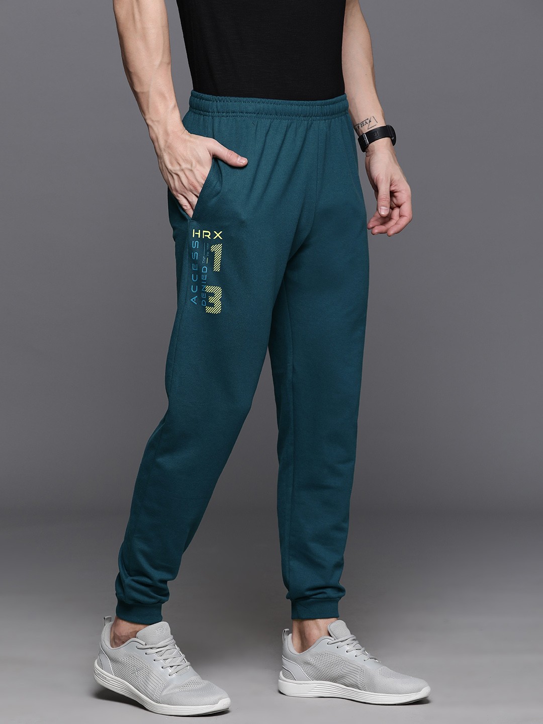 

HRX by Hrithik Roshan Men Mid-Rise Brand Logo Printed Detail Joggers, Teal